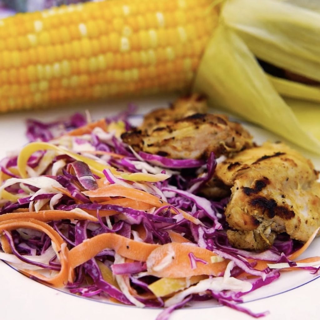 grilled lemon yogurt-marinated chicken with corn on the cob and colorful buttermilk slaw